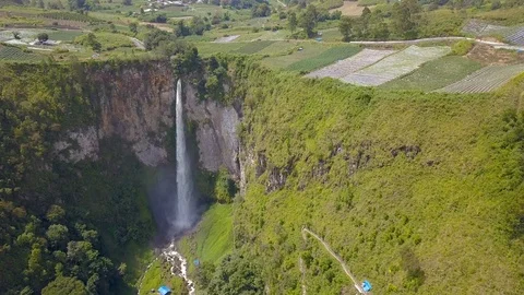 Aerial view of the highest waterfall known as Sipisopiso Waterfall in Indonesia. Stock Footage 104384909