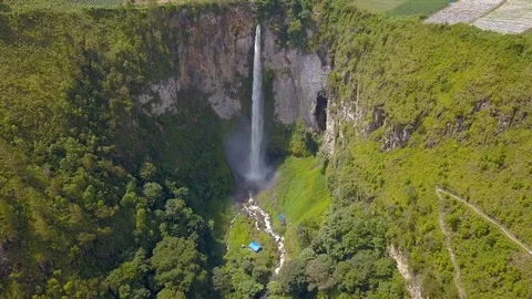Aerial view of the highest waterfall known as Sipisopiso Waterfall in Indonesia. Stock Footage 104384912