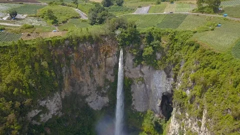 Aerial view of the highest waterfall known as Sipisopiso Waterfall in Indonesia. Stock Footage 104385127