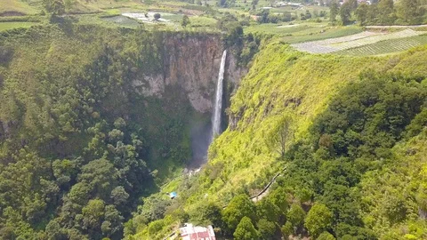 Aerial view of the highest waterfall known as Sipisopiso Waterfall in Indonesia. Stock Footage 104385710