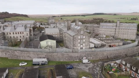 Aerial view highlighting HM Prison Dartmoor’s distinctive circular form within Stock Footage 295831143