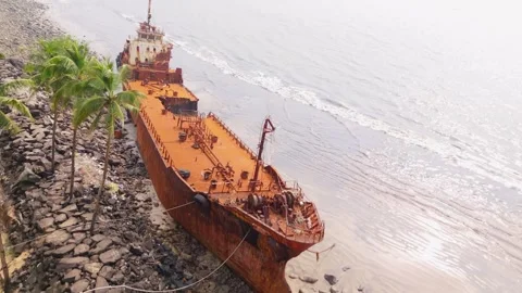 The aerial view highlights rusty vessel emerald beach Stock Footage 295924650