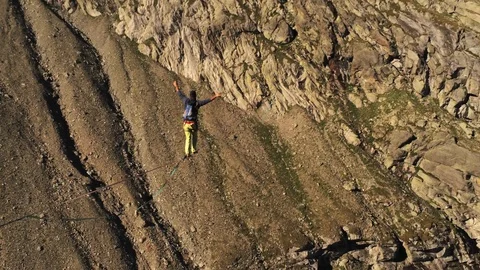 Aerial view of highline walker Stock Footage 125436643