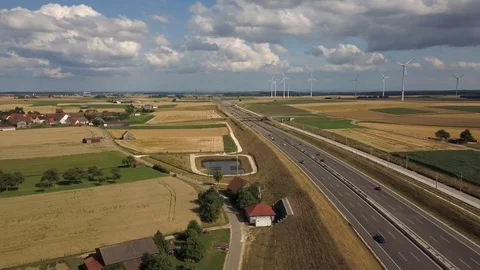 Aerial view of Highway A8 and wind turbines on the swabian alp Stock Footage 113355157