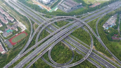 Aerial view of highway and overpass in city Stock Footage 115048997