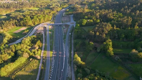 Aerial View Of Highway And Roundabouts With Dense Forest Vídeos de archivo 246745572