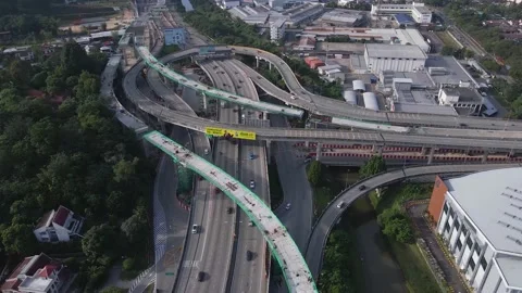 Aerial View of Highway in Between Industry and Residents  動画素材 149492178