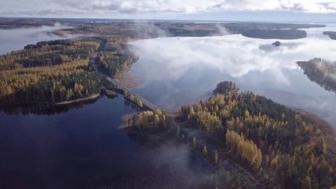 Aerial view of highway bridge at srait between lakes in Finland Stock Footage 122050657