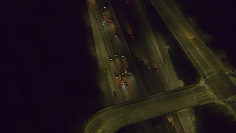 Aerial view of a highway on a clear night in Los Angeles, California. Shot on 4K Stock Footage 199453065