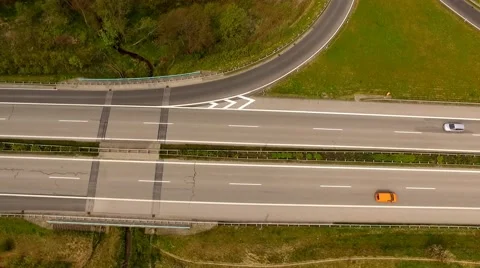 Aerial view of Highway with exit viewed from the air - Aerial view Stock Footage 62941589