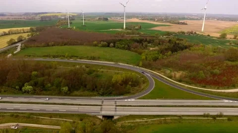 Aerial view of Highway with exit viewed from the air - Aerial view Stock Footage 62941914