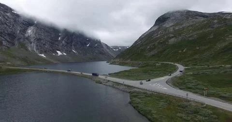 Aerial view of highway go through highland pass Stock Footage 69118375