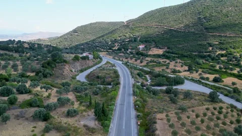 Aerial view of a highway interchange and olive groves in Greece 스톡 동영상 333148588
