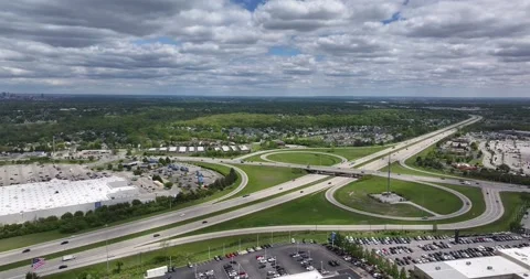 Aerial view of a highway interchange and parking lots, United States. Stock Footage 335278196