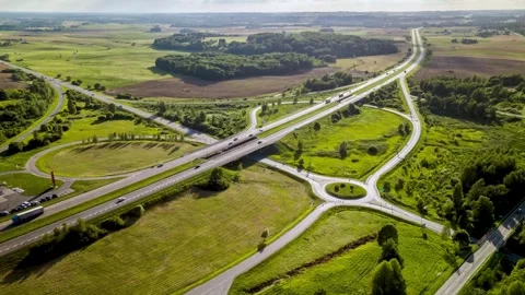 Aerial view of a highway interchange and traffic in Lithuania 스톡 동영상 345500877