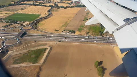 Aerial View Of Highway Interchange And Fields From Airplane Window Stock Footage 346884921