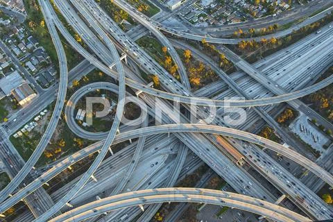 Aerial view of highway interchange in cityscape Stock Photos