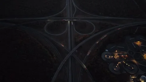 Aerial view of highway interchange at night in Sausheim, France. Stock Footage 344964650