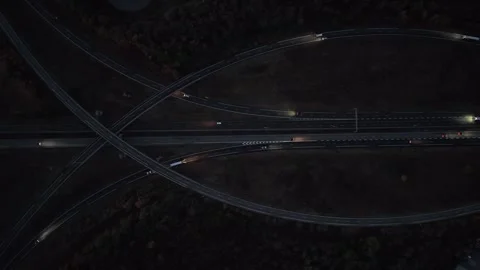 Aerial view of highway interchange at night in Sausheim, France. Stock Footage 344964693