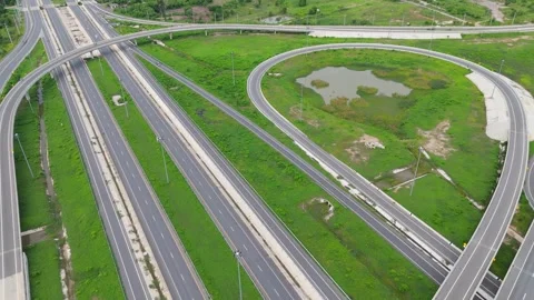 Aerial View of Highway Interchange Through Rural Agricultural Landscape Stock Footage 344915177