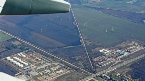 Aerial view of highway intersection and industrial complex near Sofia, Bulgaria. Stock Footage 332046701