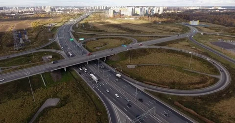 Aerial view of highway intersection with light traffic Stock Footage 82576159