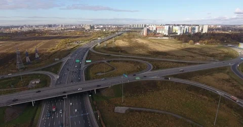 Aerial view of highway intersection with light traffic Video stock 82576192
