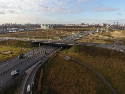 Aerial view of highway intersection with light traffic Stock Footage 82576234