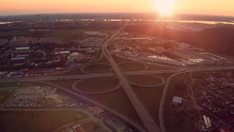 Aerial view at highway intersection or road junction with circle movement, cars Stock Footage 107873519