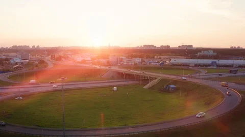 Aerial view at highway intersection or road junction with circle movement, cars Stock Footage 112031313