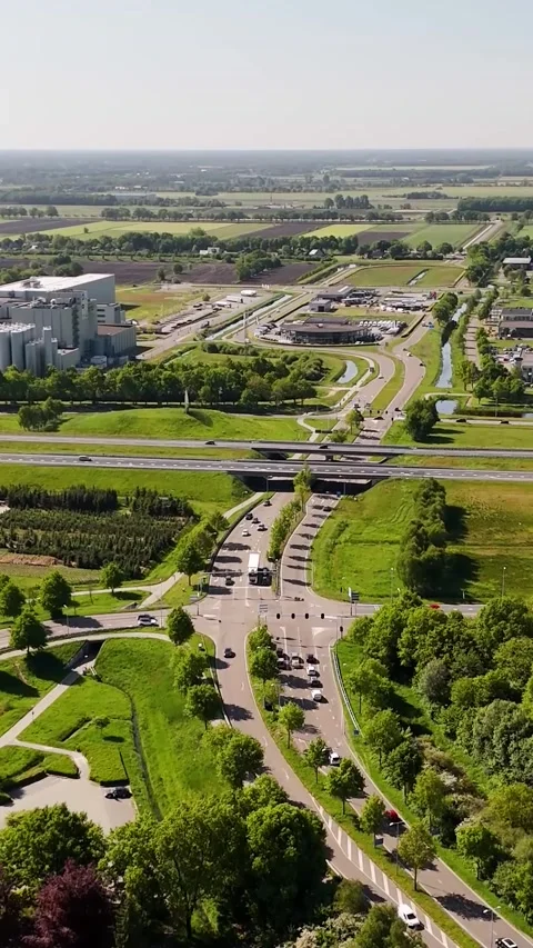 Aerial view of highway intersection traffic and rural landscape Stock Footage 327109403
