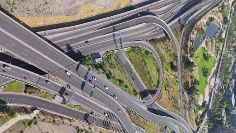 Aerial View Of Highway Junction Roads Beside Bicentenario Park In Vídeos de archivo 260221523