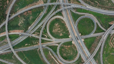 Aerial view. highway, multi-level junction road with moving cars. Cars are Stock Footage 121643752