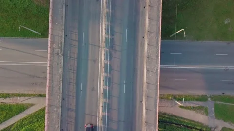 Aerial view of highway multi-level road interchange with moving cars. Stock Footage 140124223