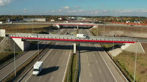 Aerial view of highway multilevel junction with bridges and overpasses Stock Footage 254338264