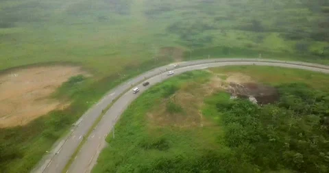 AERIAL VIEW OF HIGHWAY PASSING THROUGH AN AFRICAN COMMUNITY Stock Footage 234558250