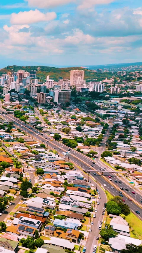 Aerial view of highway passing through residential area. Vertical video. Stock-Footage 328931355