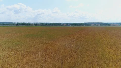 Aerial view Highway through fields, cars are driving. 스톡 동영상 119141452