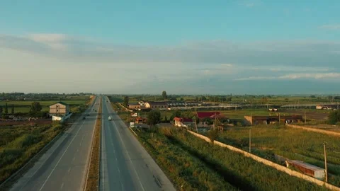 Aerial view of the highway through the fields 2 Stock Footage 318897758