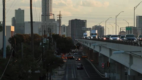Aerial View of Highway Traffic and the Downtown Austin Skyline at Dusk Texas Stock Footage 333183853