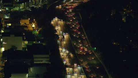 Aerial view of highway traffic on a clear night in Los Angeles, California. Shot Stock Footage 199457440