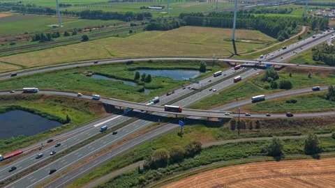 Aerial view of highway traffic cloverleaf junction 動画素材 342810816