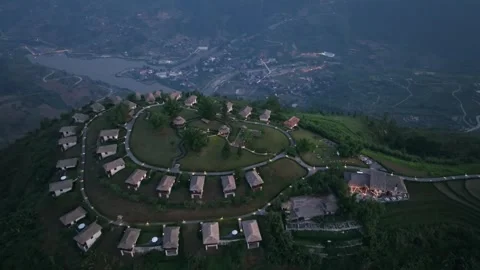 Aerial view of a hillside resort overlooking the scenic valley of Sa Pa, Lao Cai Stock Footage 340025021