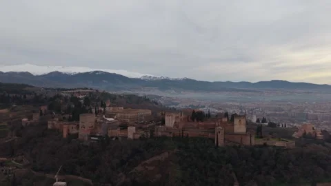 Aerial view of a hilltop fortress complex above a city Vídeos de archivo 343324658