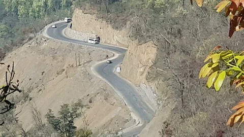 Aerial view of a hilly road Stock Footage 106720561