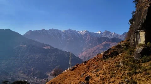 Aerial View of Himalayan Snow Covered Mountain Peaks on a Bright Sunny Day Stock Footage 340966928