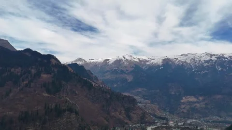 Aerial View of Himalayan Snow Covered Mountain Peaks on a Bright Sunny Day Stock Footage 340967026