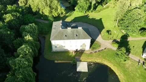 Aerial View of Historic Manor House by Pond-seg3 Stock Footage 328432553