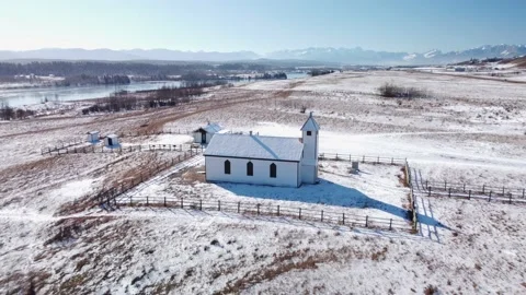 Aerial view of historic McDougall Memorial United Church during winter. Stock Footage