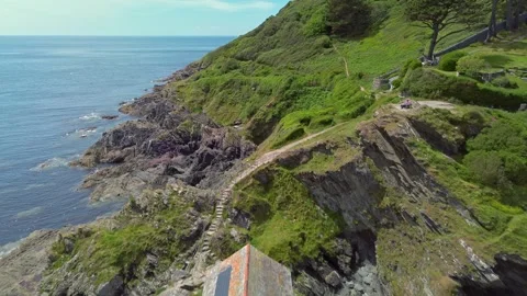 Aerial View of Historic Net Loft Coastal Structure in Polperro Cornwall England Stock Footage 336322911